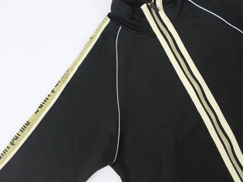 Sleeve tape and piping on the Saint Parma jacket, close up