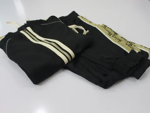 Finished Saint Parma tracksuit sets, folded