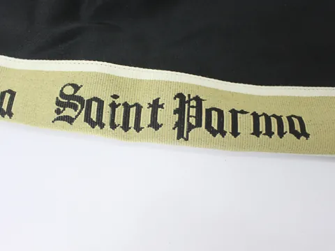 Jacquard tape woven with the Saint Parma name