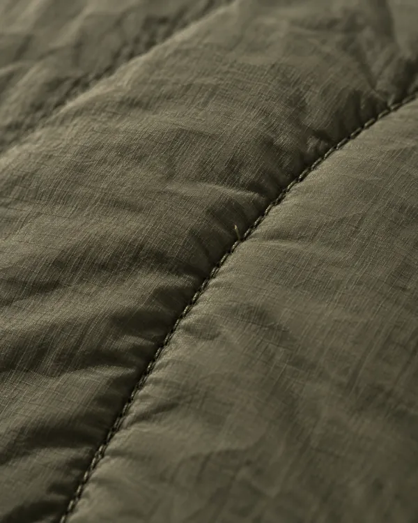 ARCH quilted liner coat, close up