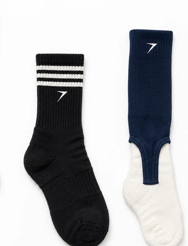 Black basketball sock with white stripes, next to a navy baseball stirrup with a bolt logo