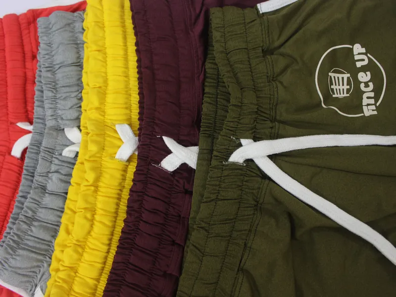 Fince Up shorts in five colors, fanned out
