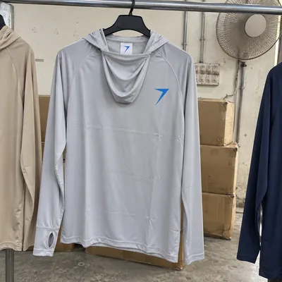 Light gray hooded fishing shirt with a face cover and a blue bolt on the chest