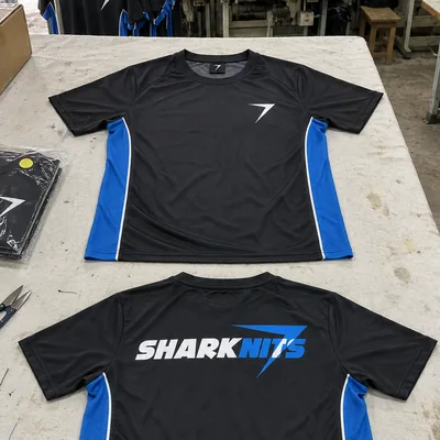Black PACE race shirt with blue mesh side panels, front and back