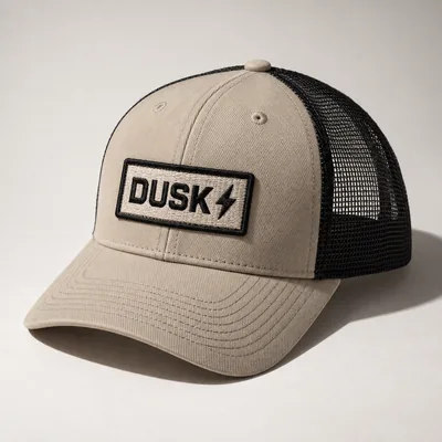 Sand trucker cap with a mesh back and a woven DUSK patch