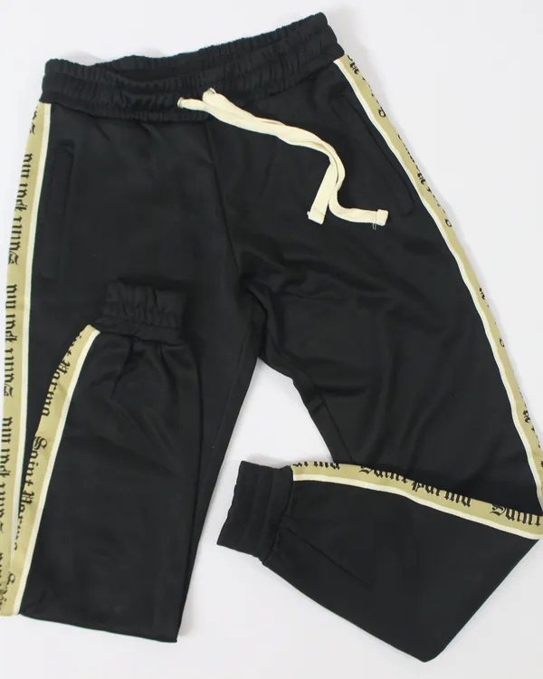 Track pants with woven side tape